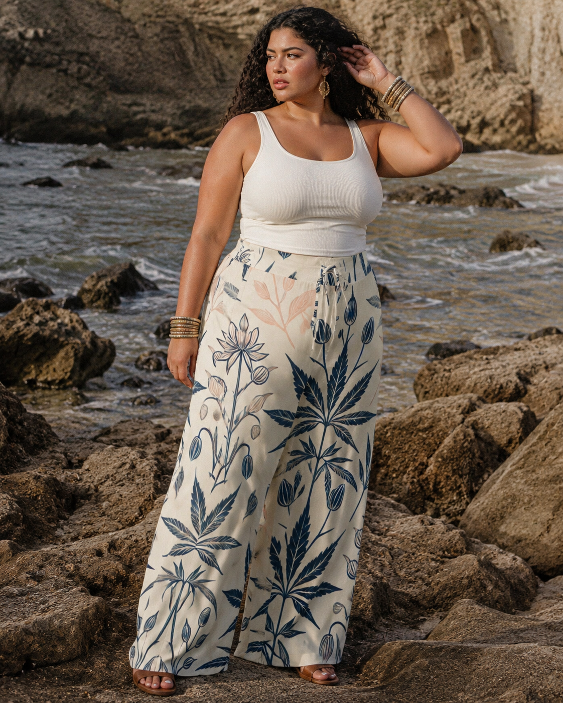 Soft sativa leaf print wide leg lounge pants, walking shot showing fabric movement