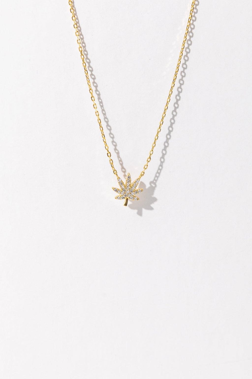 18K GOLD CANNABIS LEAF NECKLACE The Kush Girls