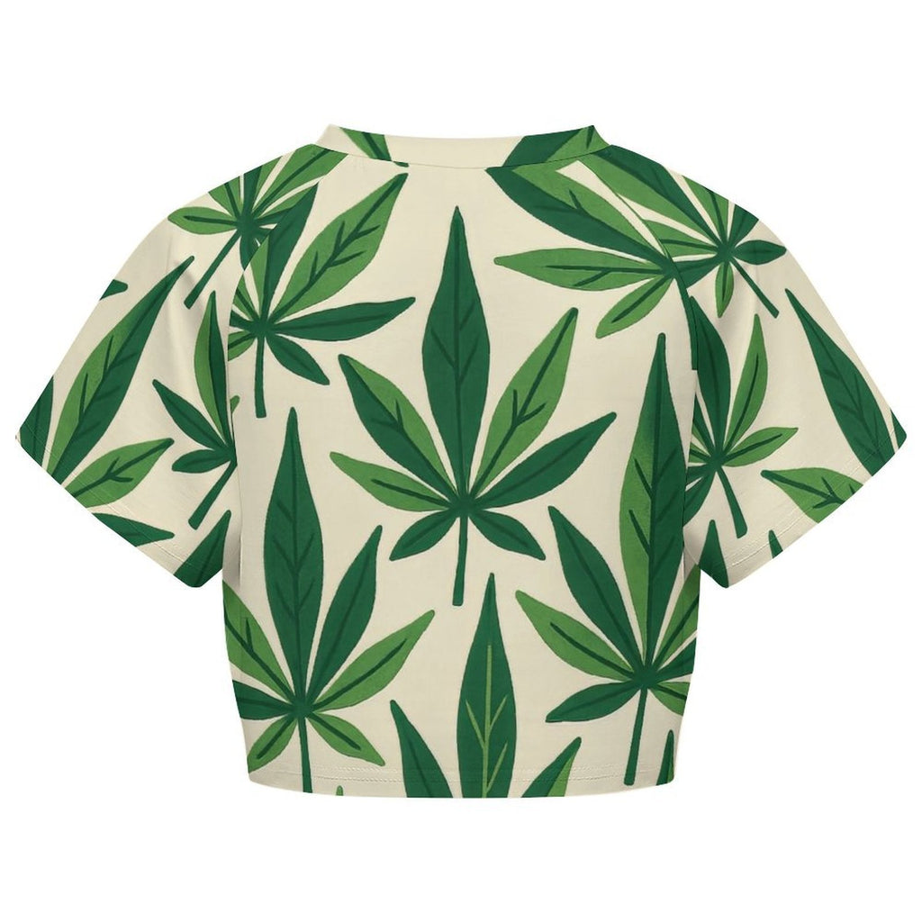 Green cannabis leaf print cropped raglan t-shirt, flat lay showing both sides