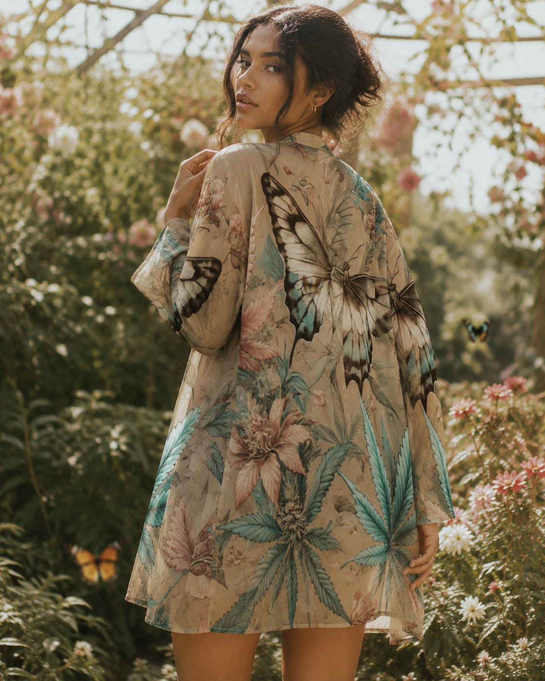 All-over print mid-length cardigan, seated lifestyle shot on model