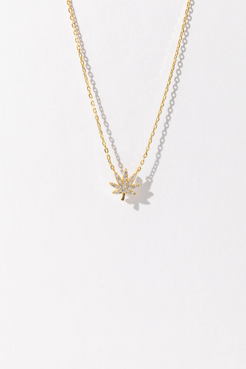 18K GOLD CANNABIS LEAF NECKLACE The Kush Girls