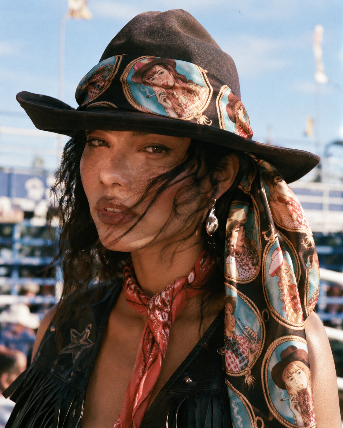Stampede graphic print silky scarf, worn as belt on model