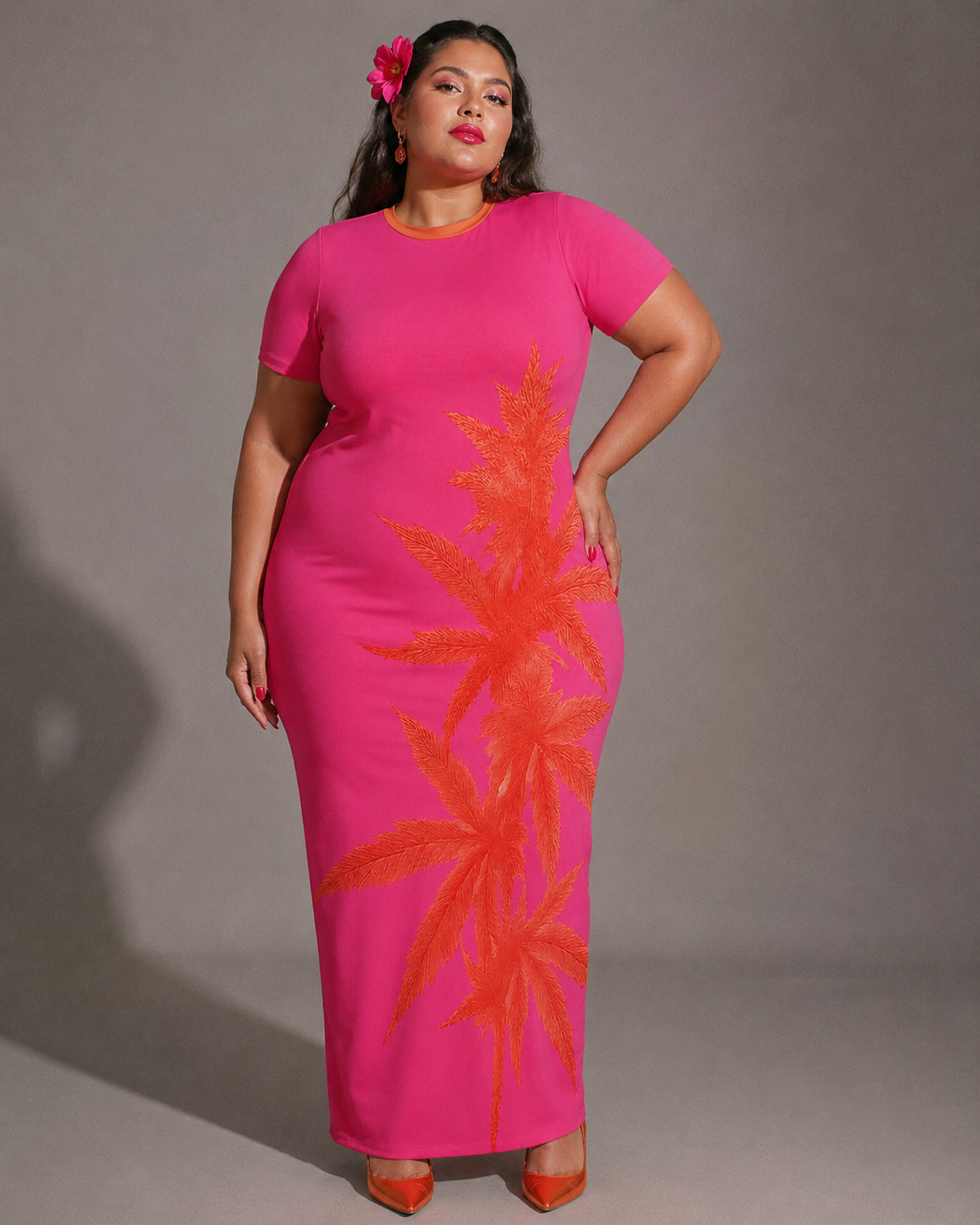 Pink tropical print bodycon dress, close-up showing fabric texture