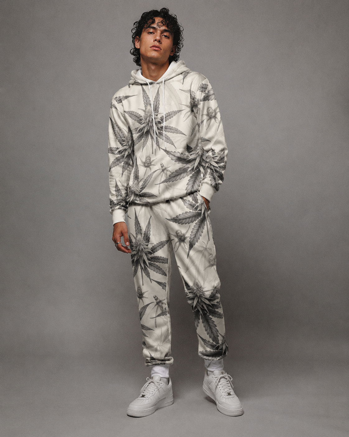 Green leaf print hoodie and sweatpants set, three-quarter view on model