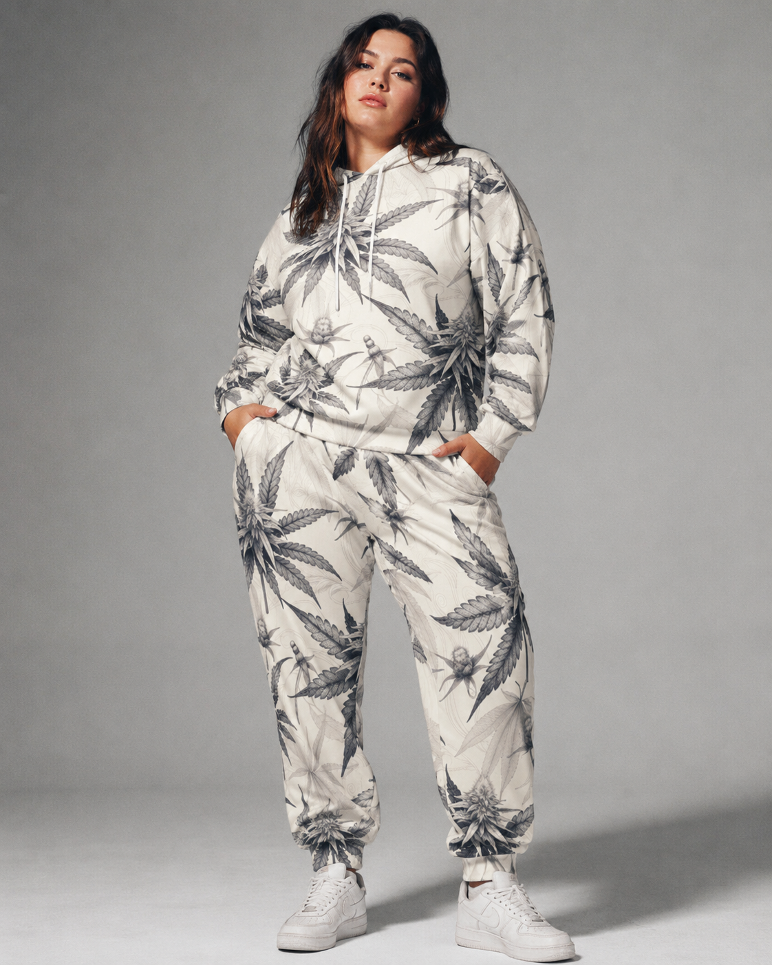 Green leaf print hoodie and sweatpants set, walking shot on model