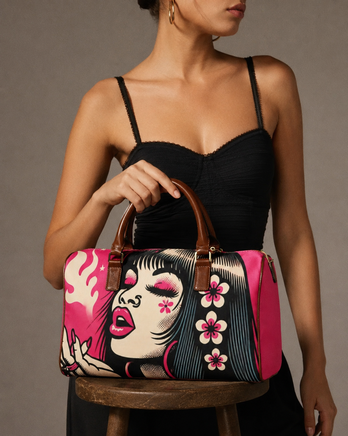 Pink leather-look travel duffel bag, front view
