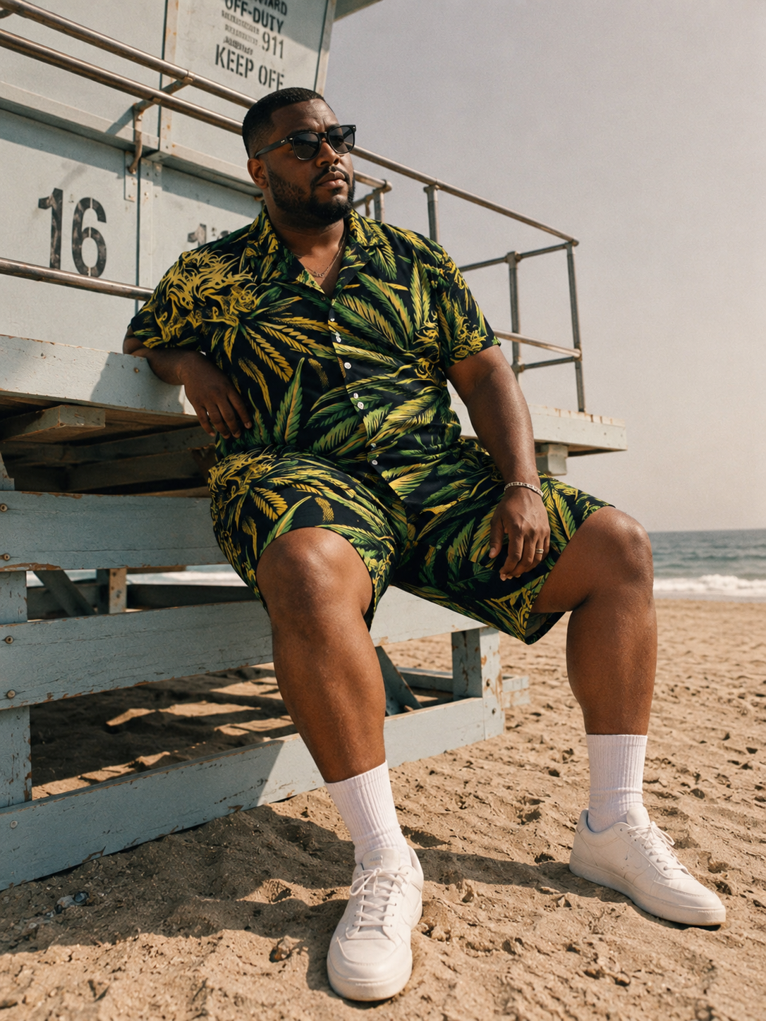 Bud print beach shirt and shorts set, lifestyle editorial shot on model