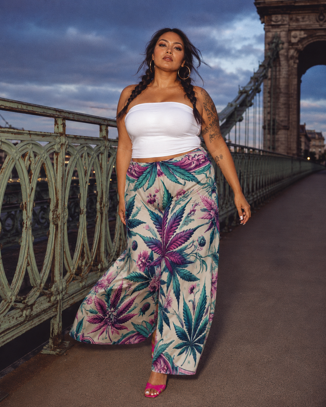 Graphic print wide leg flow pants, close-up showing fabric and print detail