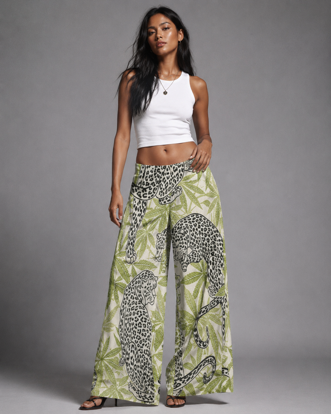 Leopard print wide leg pants, three-quarter view on model
