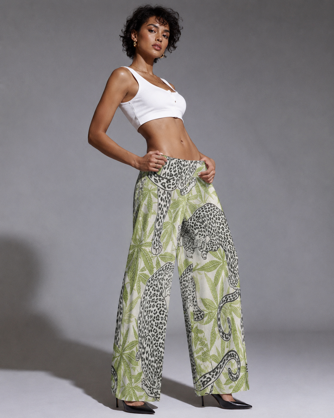 Leopard print wide leg pants, walking shot on model