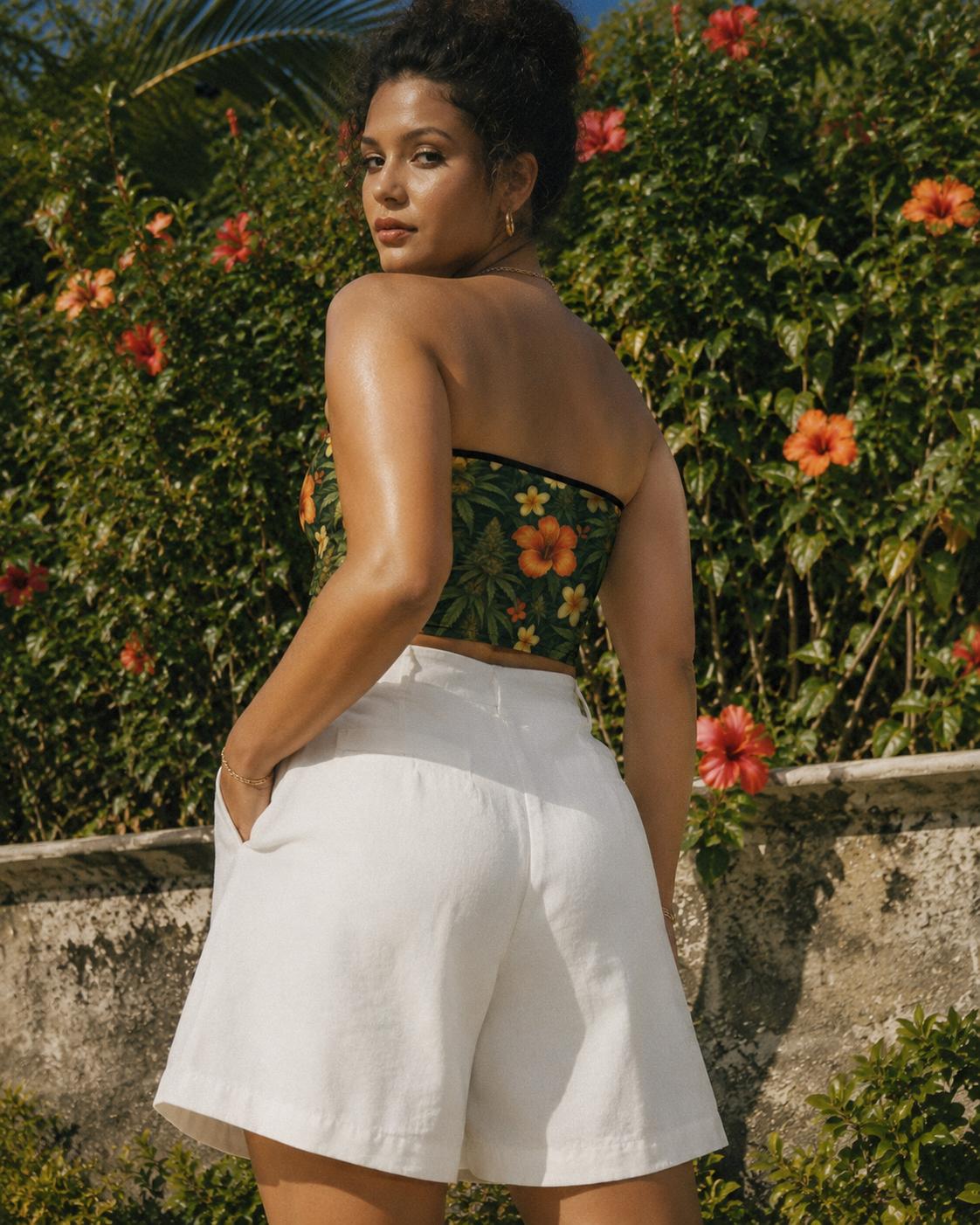 Hibiscus floral print bandeau top, lifestyle editorial shot on model