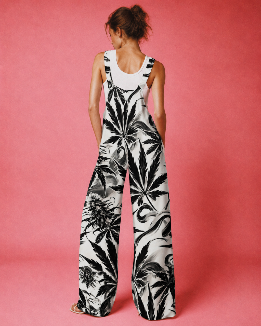 White Widow spider web print jumpsuit, side view on model showing silhouette