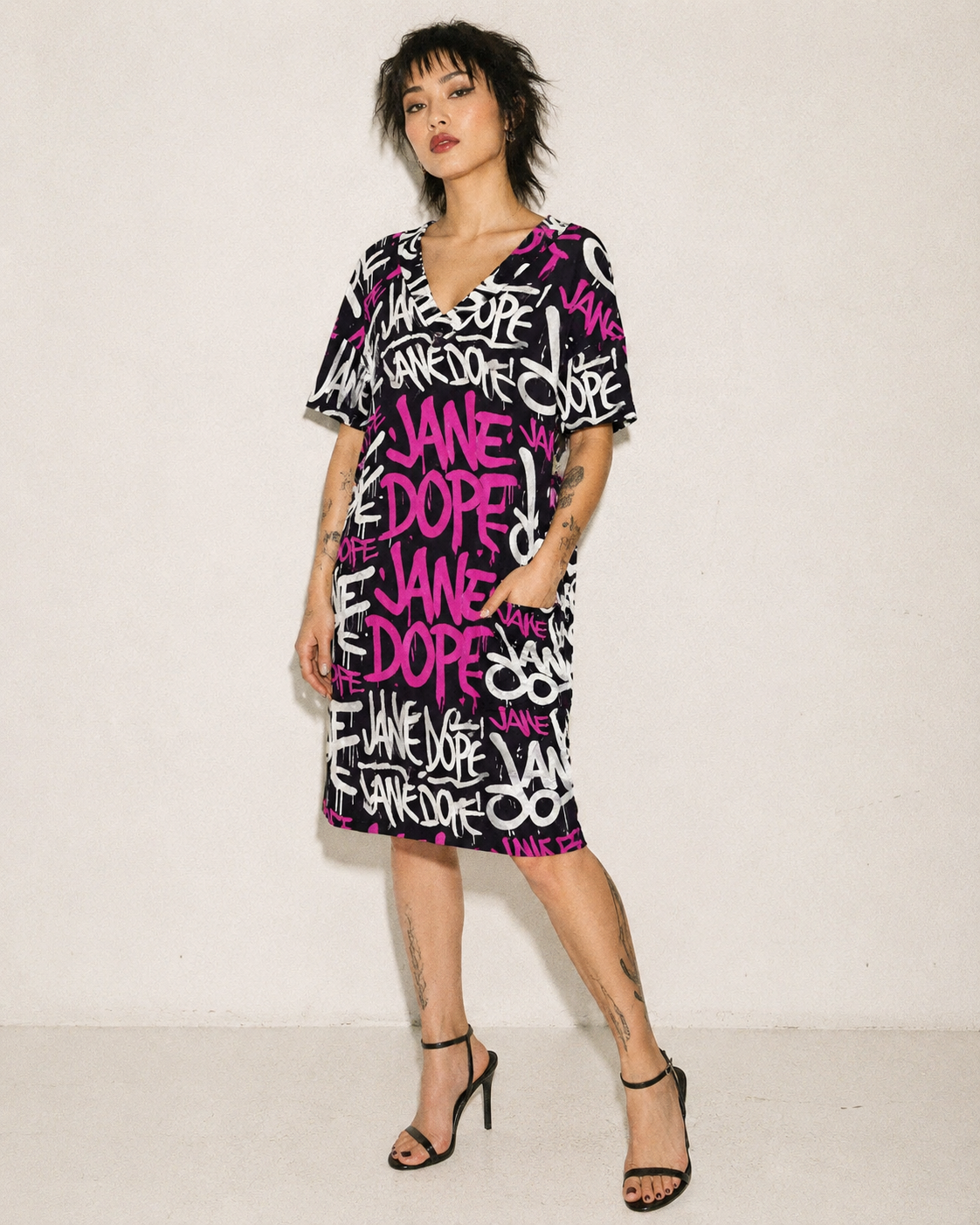 Jane Dope DANK! hot pink graffiti print cotton pocket dress, front view on model