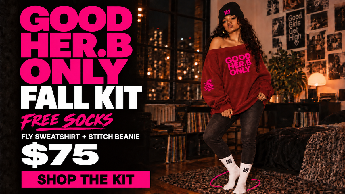 A promotional lifestyle image for the Good Her. B Only Fall Kit, featuring a model wearing a maroon sweatshirt with pink text, black pants, white socks, and a black beanie in a cozy, dimly lit room.