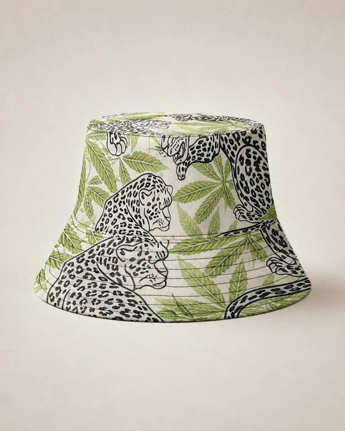 Leopard print bucket hat, three-quarter view on model