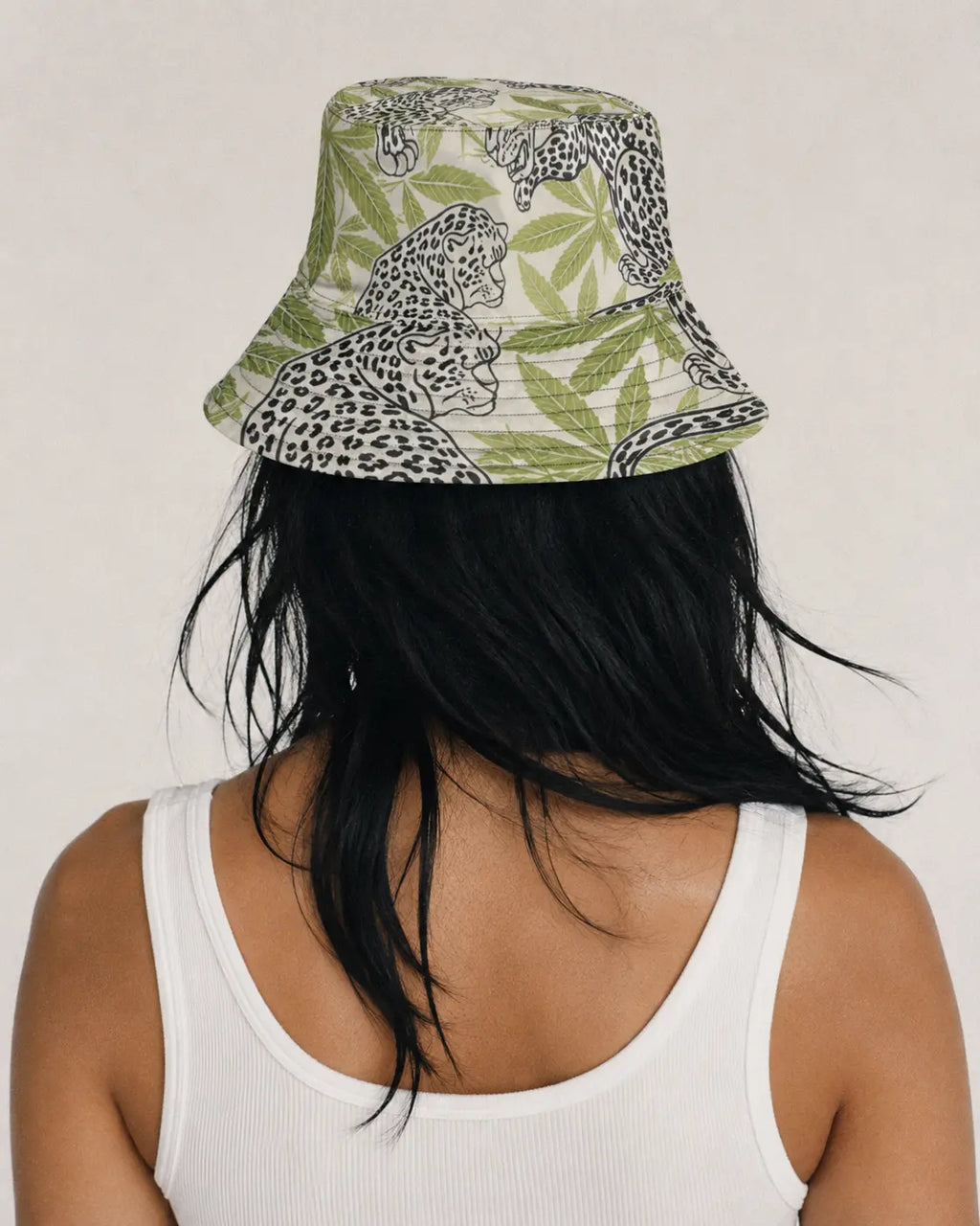 Leopard print bucket hat, side profile view on model