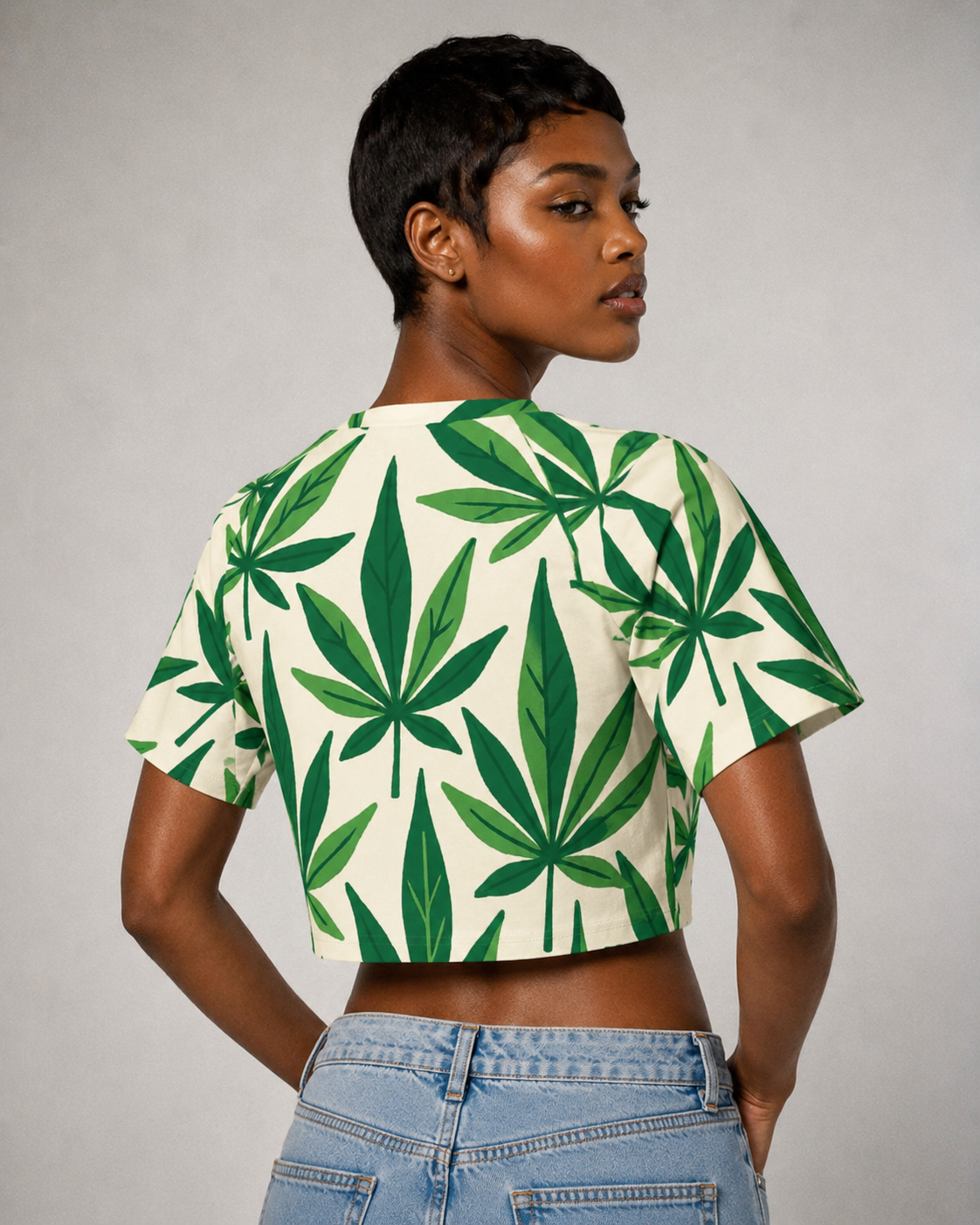 Green cannabis leaf print cropped raglan t-shirt, back view on model