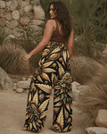 Batik print wide leg lounge pants, seated lifestyle shot on model