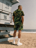 Bud print beach shirt and shorts set, side view on model