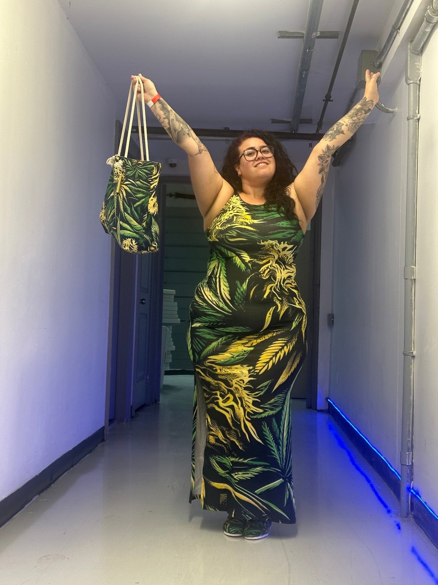 Bud print sleeveless long dress, hem and print detail close-up