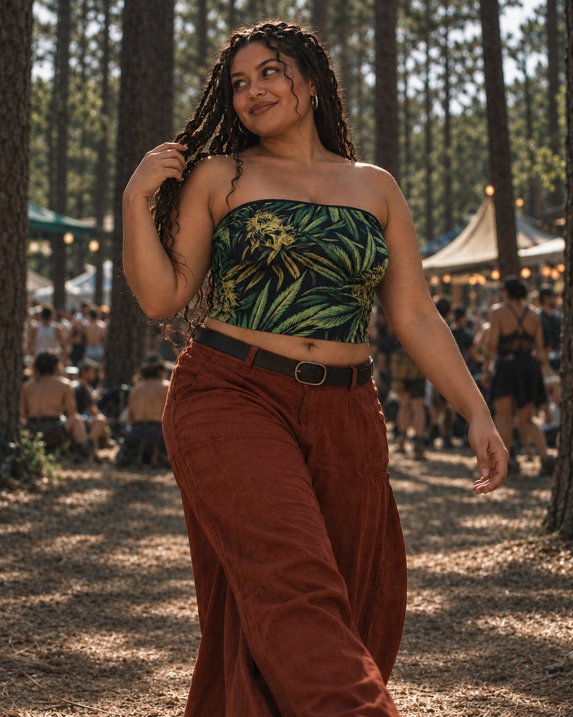 Big Buds green botanical print strapless crop top, front view as a model walks along a woodland path