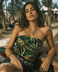 Big buds print tube crop top, seated lifestyle shot on model