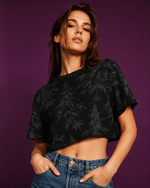 Jane Dope black spider web print women's cropped athletic t-shirt, front view on model