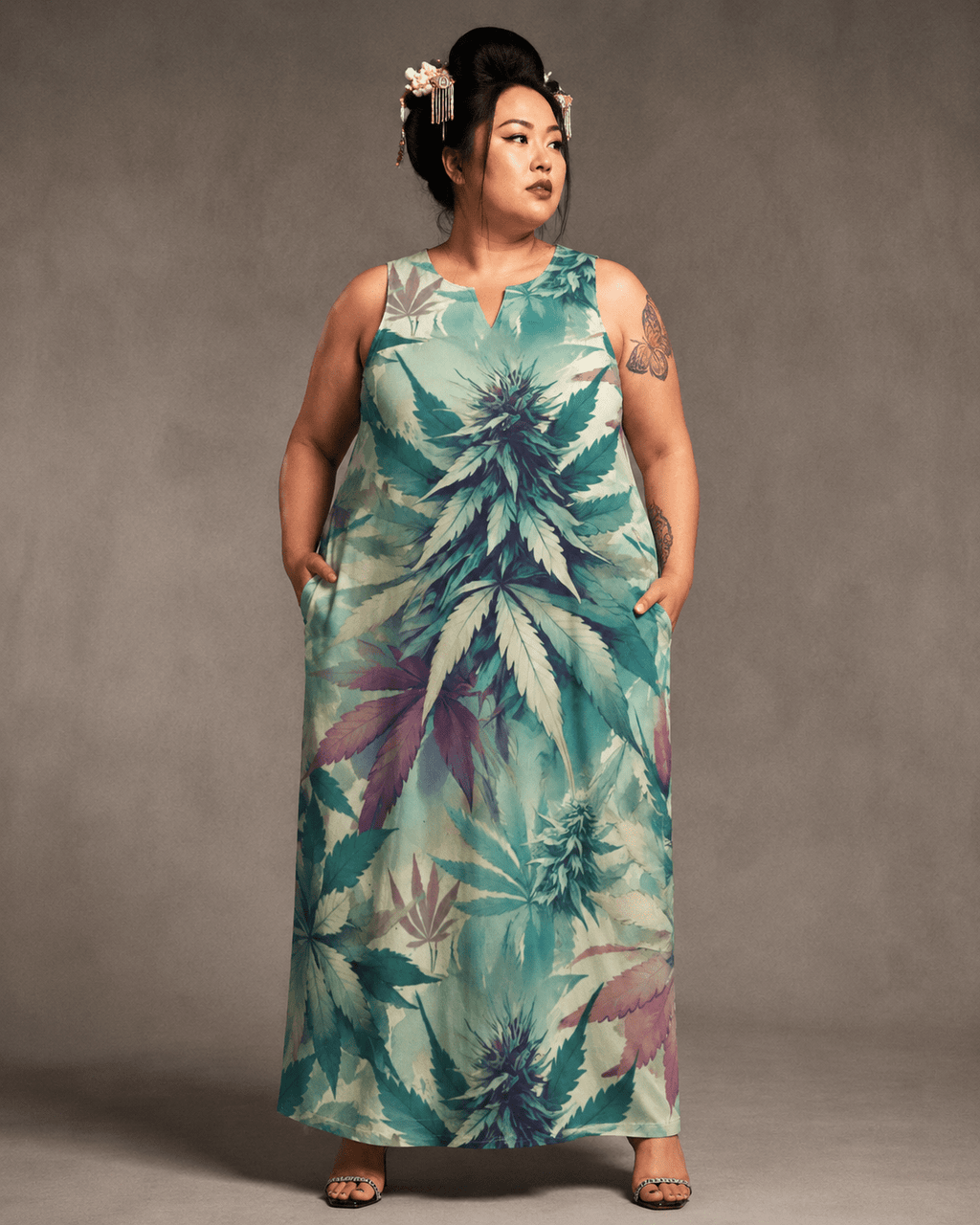 Cola Love graphic print long pocket dress, seated lifestyle shot on model