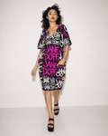 DANK! hot pink graffiti print pocket dress, side view on model