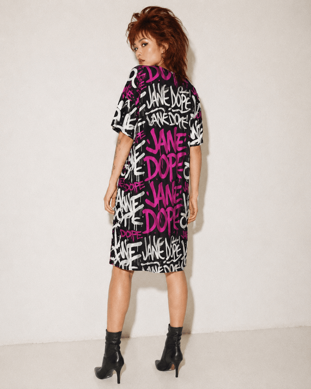 DANK! hot pink graffiti print pocket dress, back view on model