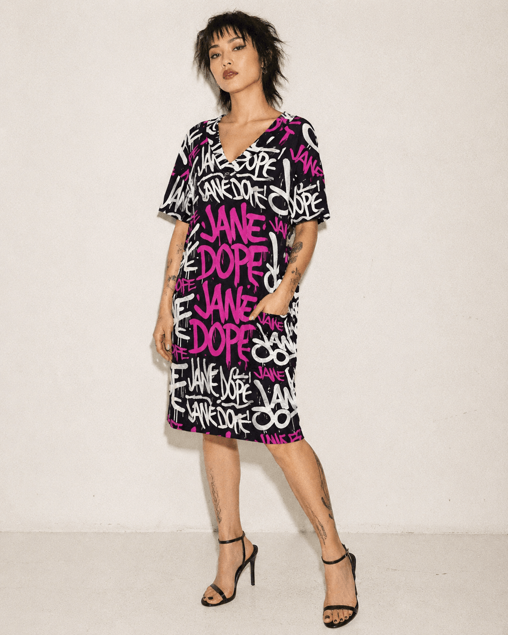 Jane Dope DANK! hot pink graffiti print cotton pocket dress, front view on model