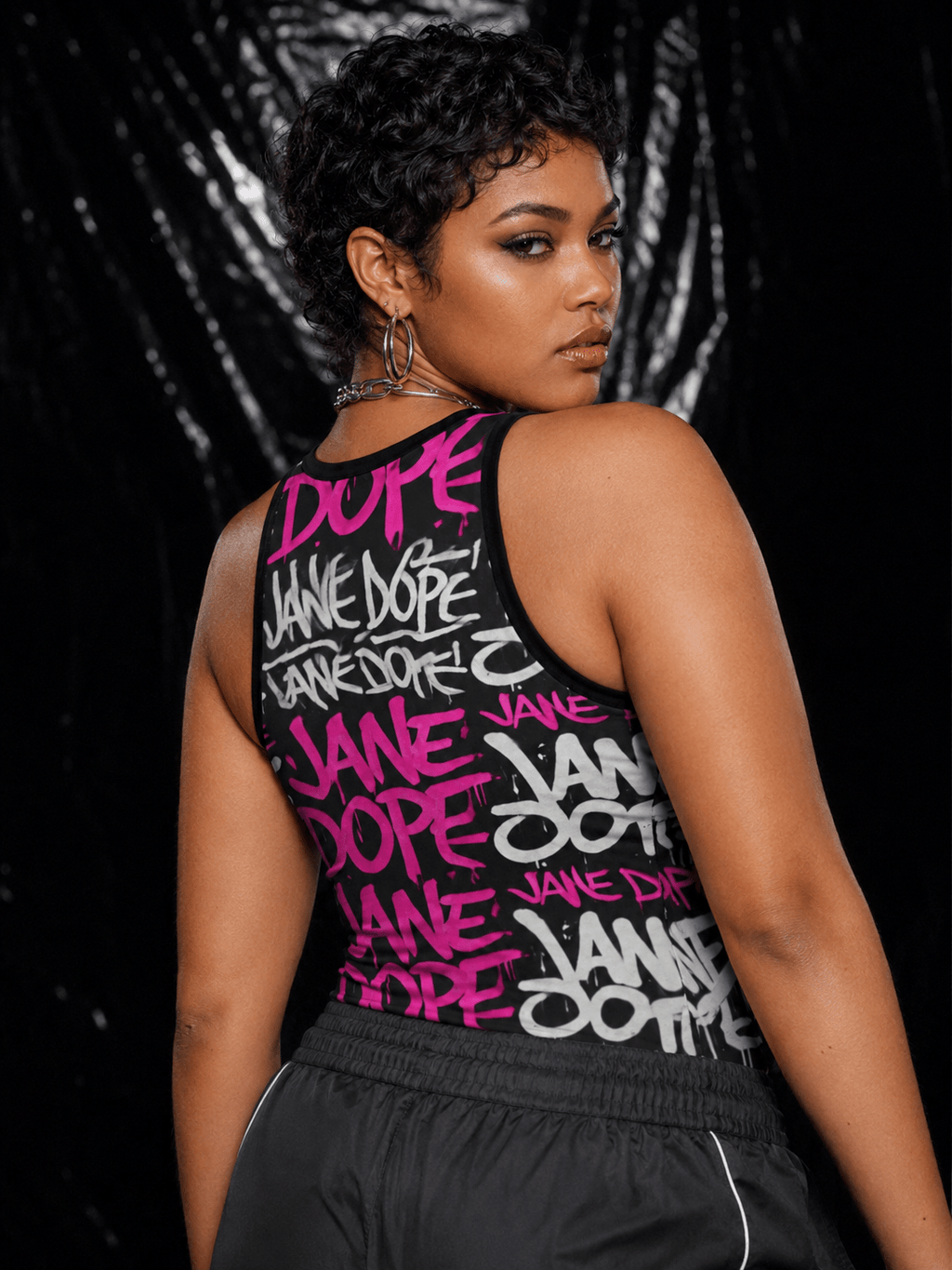 Graphic print racerback tank top, lifestyle editorial shot on model