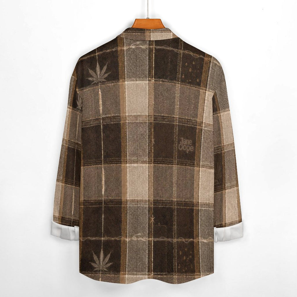 Rear construction view of the Lumber Jane brown plaid shirt with Herb motifs, Jane Dope lettering and curved hem.