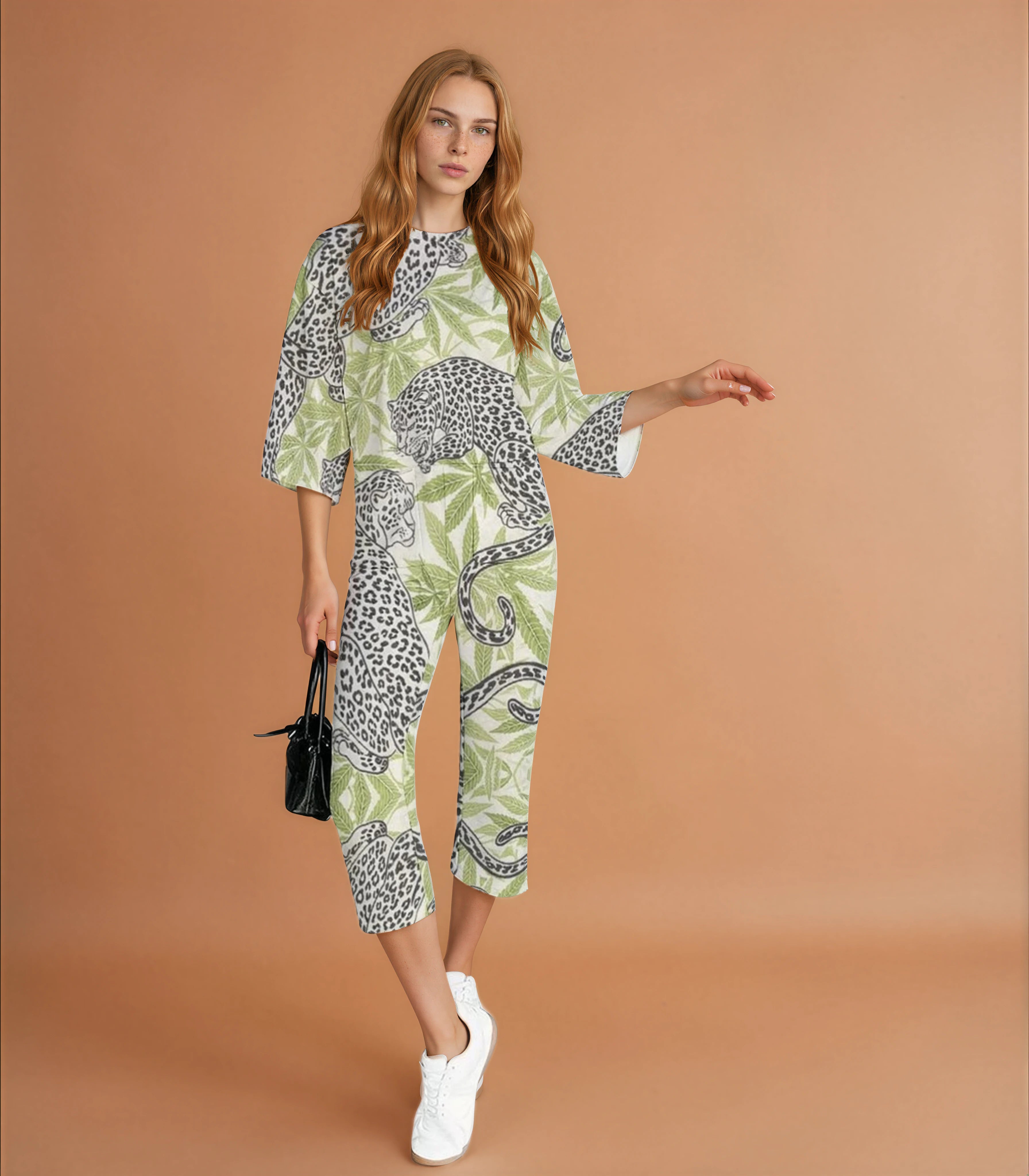 leopard and leaves jumpsuit against brown background
