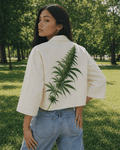 Floral bloom print cropped cotton jacket, side view on model