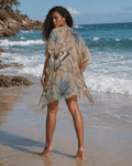 All-over print beach cover-up, side view on model showing drape