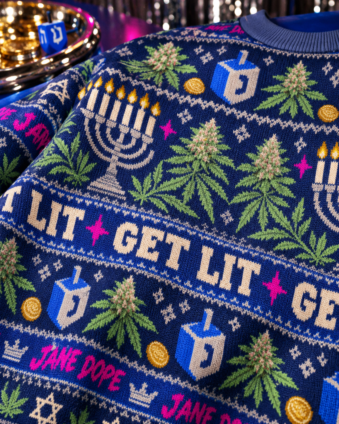 Close-up of knit-textured polyester, Get Lit lettering and Hanukkah print