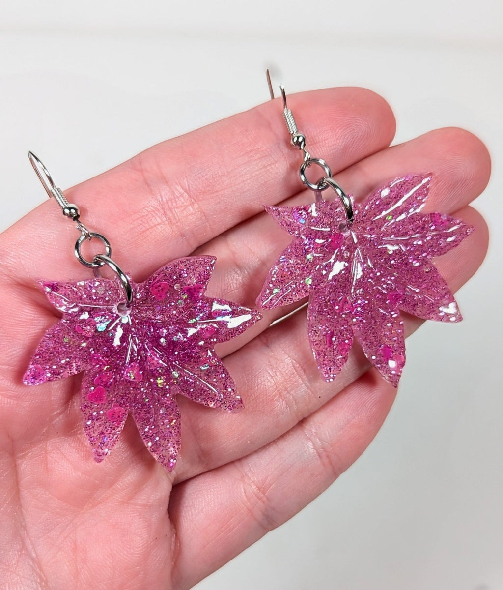 Glitter moonstone cannabis leaf earrings, packaging detail