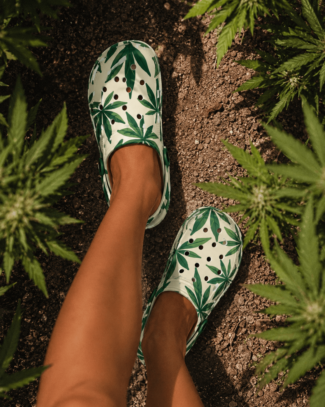 Leaf print foam clogs, pair flat lay showing both sides