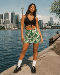 Leaf print mini skirt, back view on model