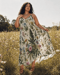 HER.B floral garden print long spaghetti strap dress, walking shot showing fabric movement