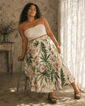 HER.B floral garden print pleated midi skirt, side view on model