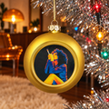 Hotbox Xmas Ornament in gold hanging from a silver tinsel tree