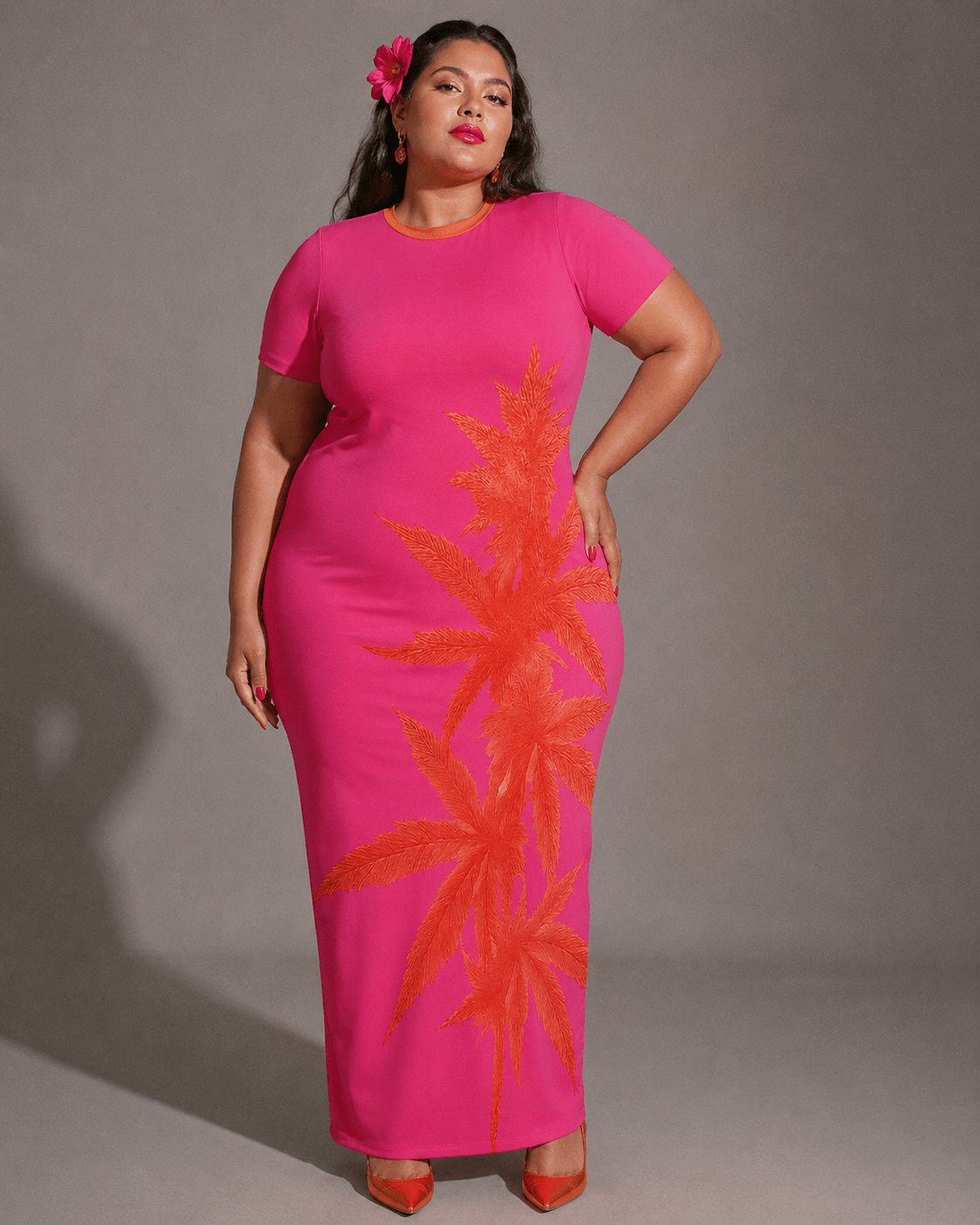 Pink tropical print bodycon dress, close-up showing fabric texture