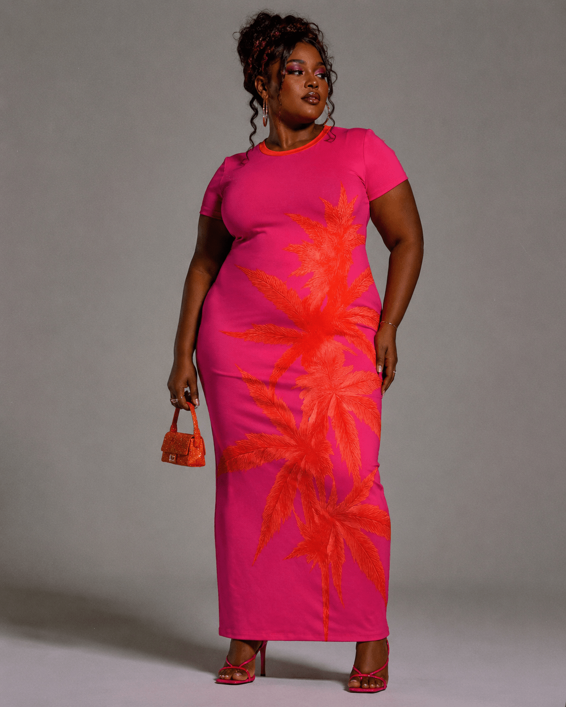 Pink tropical print bodycon dress, print detail close-up
