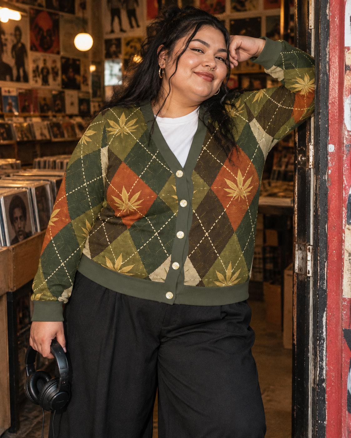 Buttoned botanical argyle cardigan in a record-shop doorway
