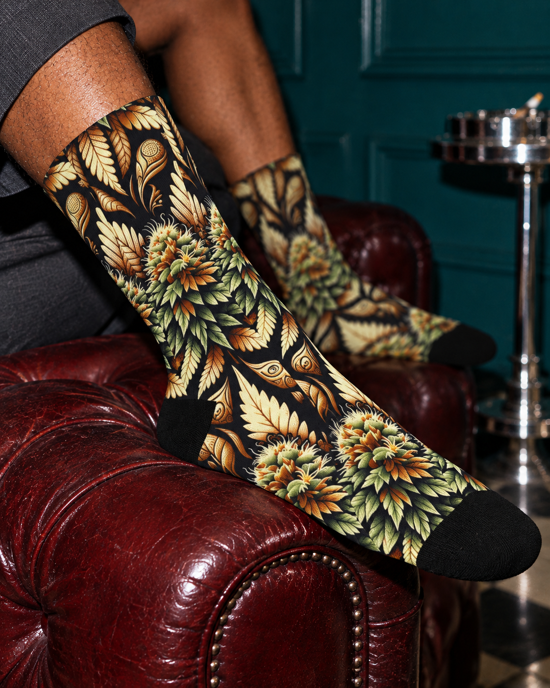 Close-up of Batik Buds sock botanical artwork and solid black heel and toe