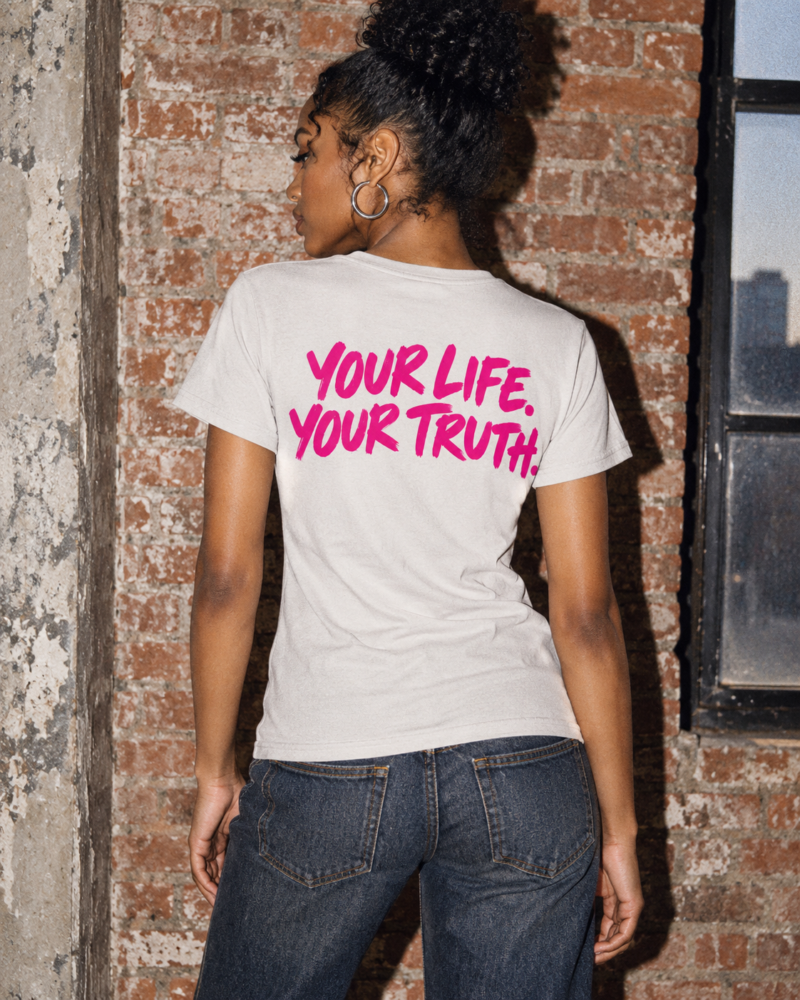 Back of BE JANE DOPE tee showing YOUR LIFE. YOUR TRUTH. lettering with dark denim.