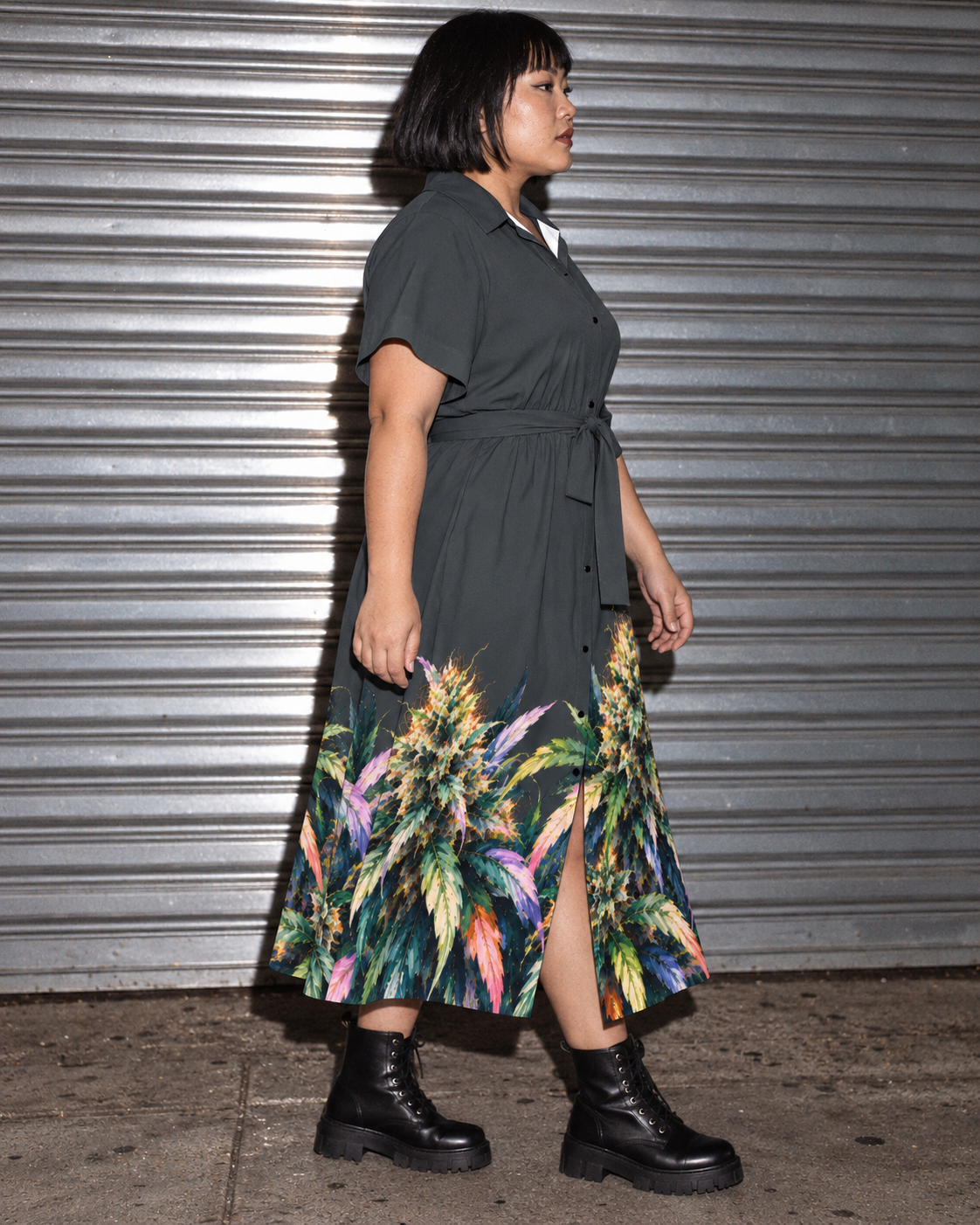 Blue Mazar charcoal botanical shirt dress, side editorial view with silver corrugated shutter.