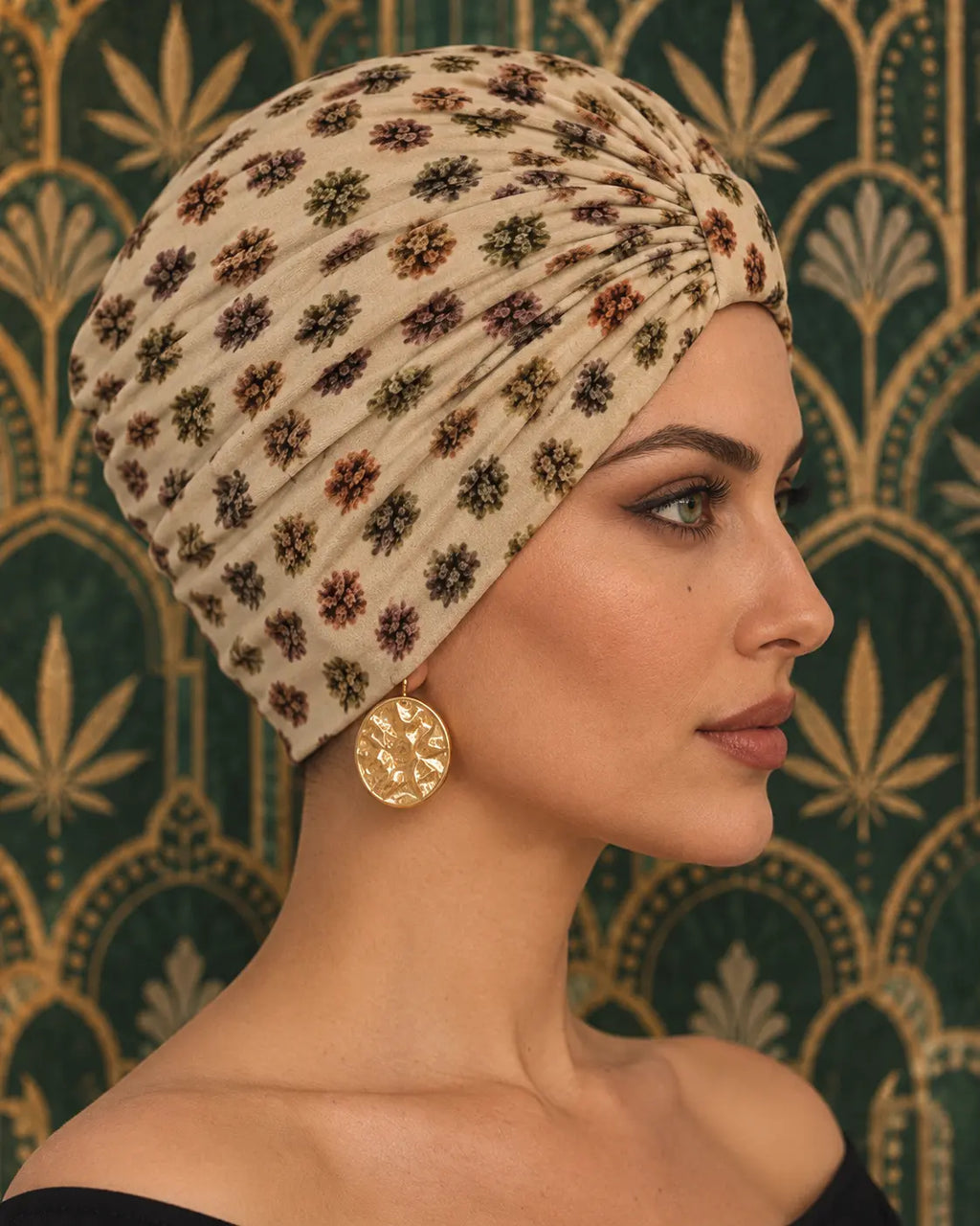 Side profile of Bud Dots Turban Cap showing its fitted shape and beige printed stretch velour.